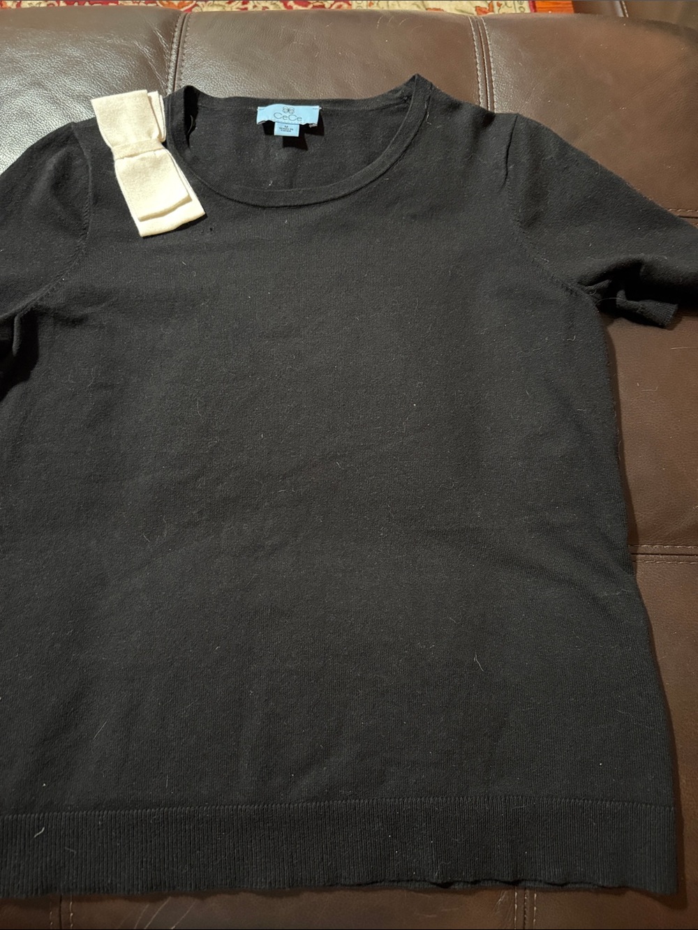 CeCe Black Short-Sleeve Crewneck Tee with Cream Shoulder Bow Accent